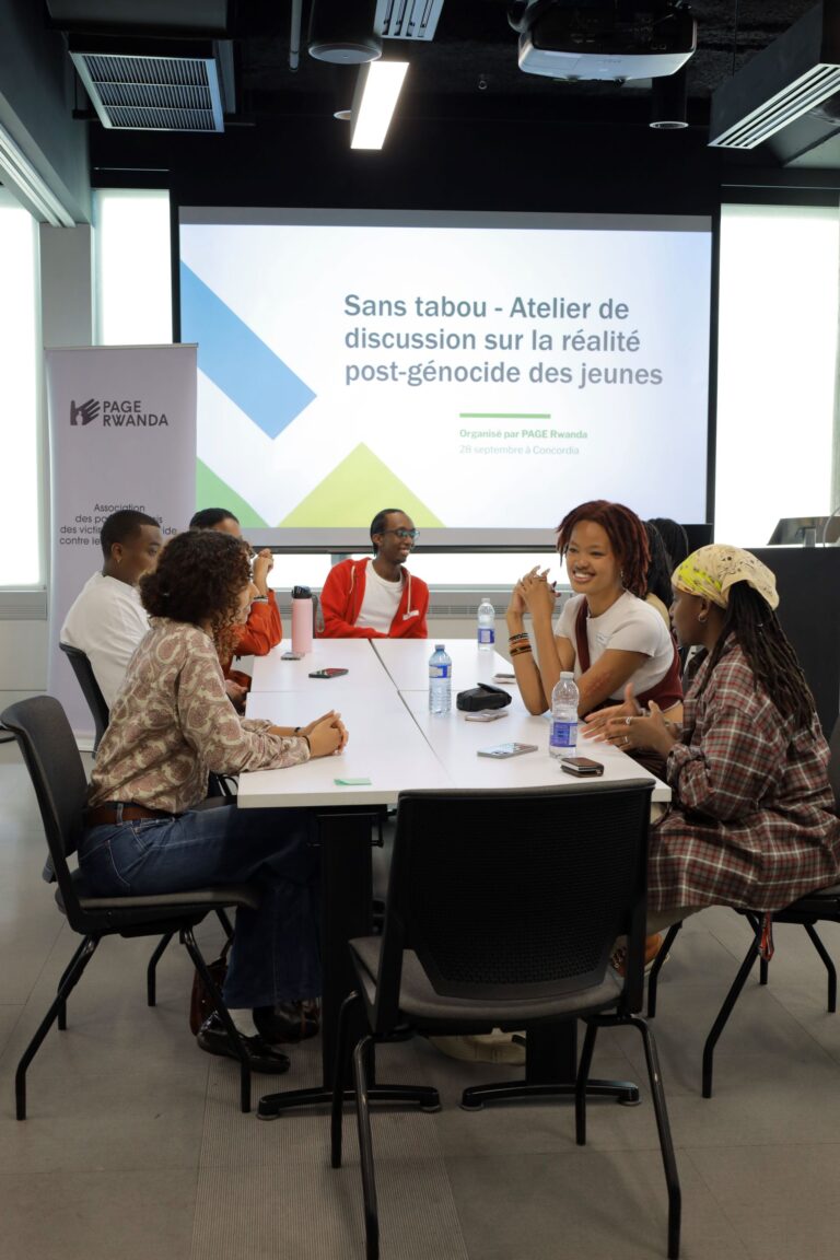 A group of people sitting around a table.