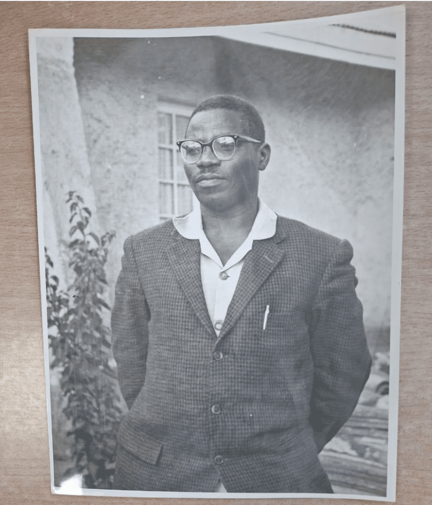 Man in suit with glasses, vintage photo.